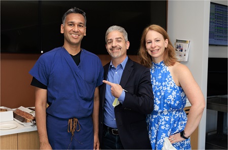 Ira Rosenau, center, with his wife, Jennifer, and cardiologist Jay S. Giri, MD, MPH